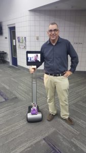 Professors Genereux & Knopp (appearing on remote-controlled robot screen)